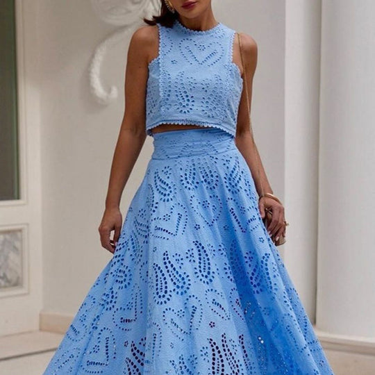 🌿👗Nouveaux produits 2025🔥 Ensemble 2 pièces avec un haut sans manches à découpes et une jupe fluide🌸💖