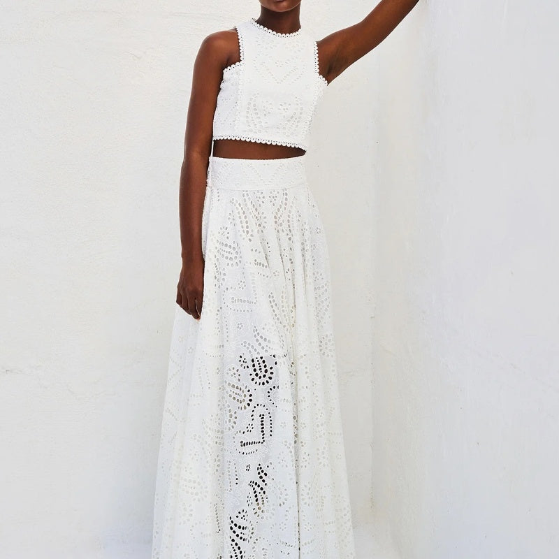 🌿👗Nouveaux produits 2025🔥 Ensemble 2 pièces avec un haut sans manches à découpes et une jupe fluide🌸💖