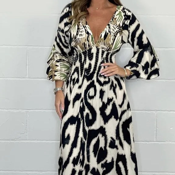 Breathable, fashionable, long A-line dress with V-neck🔥Hot Sale – 49 % DISCOUNT🔥