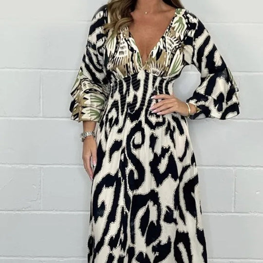 Breathable, fashionable, long A-line dress with V-neck🔥Hot Sale – 49 % DISCOUNT🔥