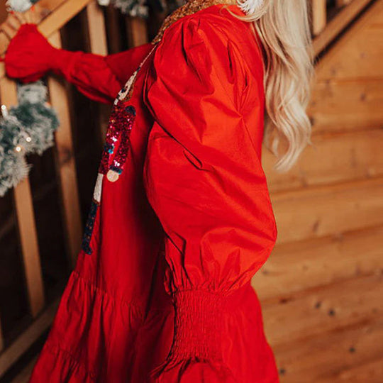 Mini vestido de manga larga con lentejuelas de cascanueces y un tapón de botón