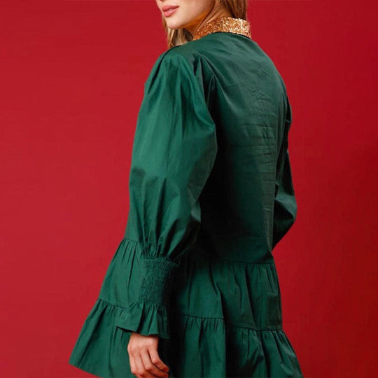 Mini vestido de manga larga con lentejuelas de cascanueces y un tapón de botón