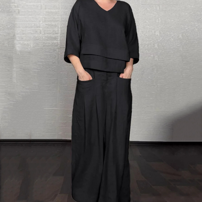 💎 2-teiliges Set aus Baumwoll-Leinen mit unregelmäßigem Saum – V-Ausschnitt-Oberteil + Weitbein-Hose, atmungsaktiv & mühelos stilvoll 🍂👚