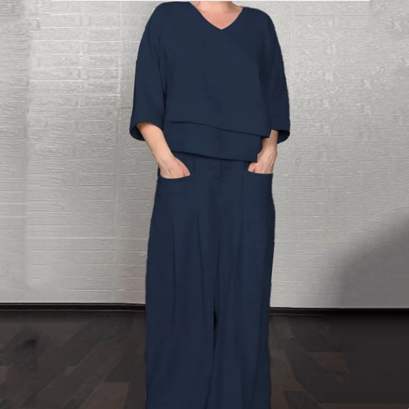 💎 2-teiliges Set aus Baumwoll-Leinen mit unregelmäßigem Saum – V-Ausschnitt-Oberteil + Weitbein-Hose, atmungsaktiv & mühelos stilvoll 🍂👚