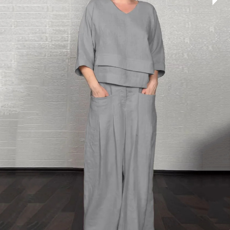 💎 2-teiliges Set aus Baumwoll-Leinen mit unregelmäßigem Saum – V-Ausschnitt-Oberteil + Weitbein-Hose, atmungsaktiv & mühelos stilvoll 🍂👚