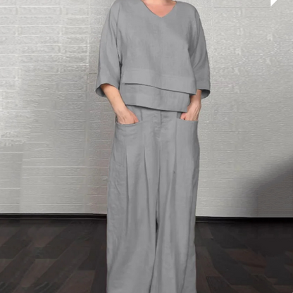 💎 2-teiliges Set aus Baumwoll-Leinen mit unregelmäßigem Saum – V-Ausschnitt-Oberteil + Weitbein-Hose, atmungsaktiv & mühelos stilvoll 🍂👚