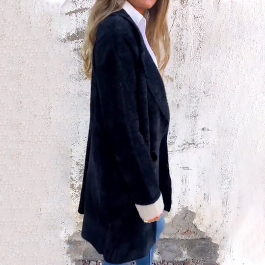 Cappotto classico ed elegante da donna di lunghezza midi