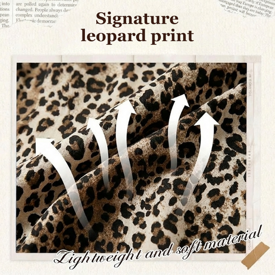 Damebluse med leopardmønster med kontrasterende mesh-innlegg