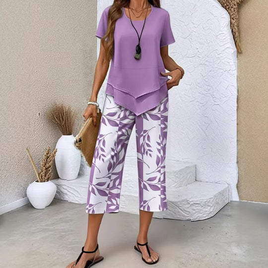 🎉50% Rabatt – Nur für kurze Zeit!✨ Modisches 2-in-1-Set | Oberteil mit asymmetrischem Saum + bedruckte Hose | S–5XL 👗