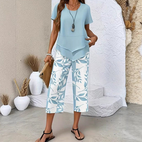 🎉50% Rabatt – Nur für kurze Zeit!✨ Modisches 2-in-1-Set | Oberteil mit asymmetrischem Saum + bedruckte Hose | S–5XL 👗